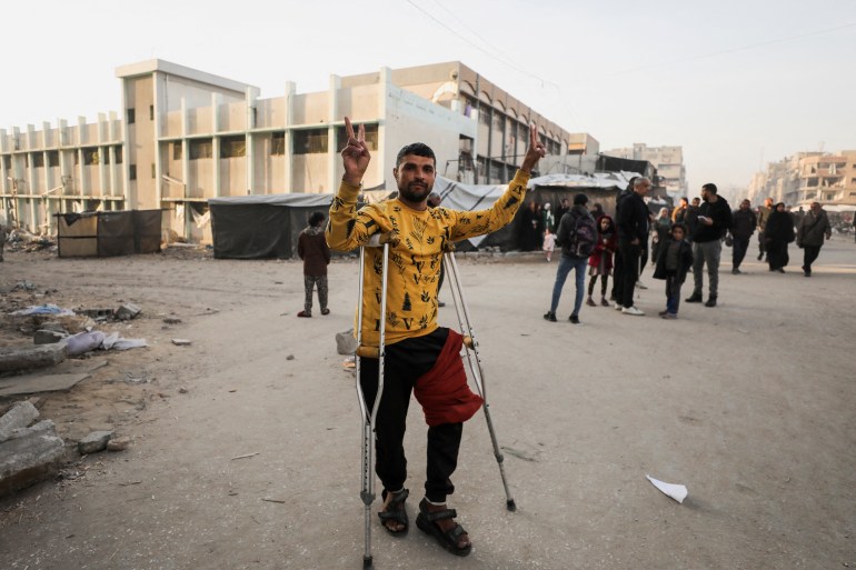 A Palestinian man reacts before a ceasefire between Israel and Hamas takes effect, in Gaza City, January 19, 2025. REUTERS/Dawoud Abu Alkas