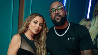 محظوظ في الحب! Larsa Pippen و BF Marcus Jordan Cuddle في F1 Bash