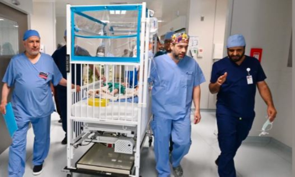 صور| بدء عملية فصل التوأم الطفيلي المصري محمد عبدالرحمن جمعة