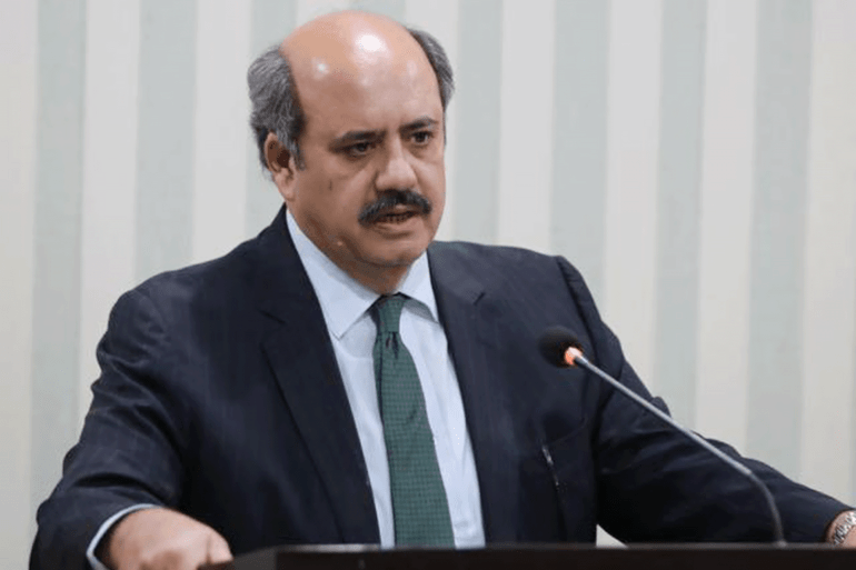 أستاذ العلاقات الدولية وكلية السياسة في جامعة قائد أعظم في <a class=