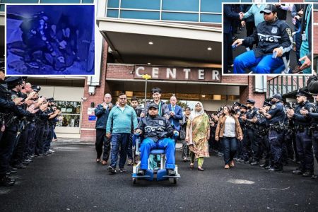 شرطي خارج شرطة نيويورك تشودوري نافيس التي تم إطلاقها من المستشفى بعد سرقة عنيفة