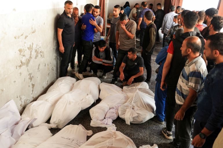 Mourners react next to the bodies of Palestinians killed in Israeli strikes, during the funeral at Al-Ahli Arab Baptist hospital, in Gaza City, May 20, 2025. REUTERS/Dawoud Abu Alkas TPX IMAGES OF THE DAY