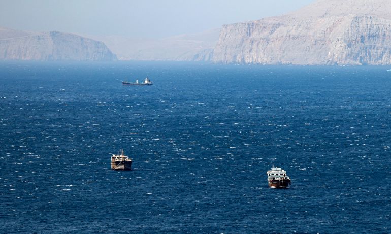 epa12194514 Ships in the Strait of Hormuz as seen from Khasab, Musandam Governorate, Oman, 24 June 2025. The Iranian parliament approved a measure to close the Strait of Hormuz following US strikes on three of Iran's key nuclear sites on 22 June 2025. Israel and Iran have been exchanging fire since Israel launched strikes across Iran on 13 June 2025. EPA/ALI HAIDER